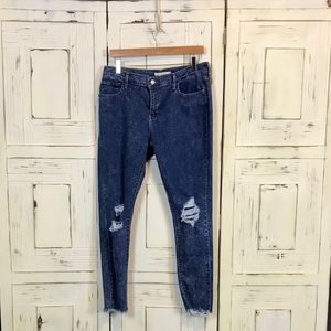 710 Levi’s Super Skinny Distressed Jeans